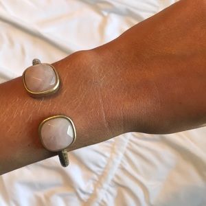 Gold cuff with pink stone